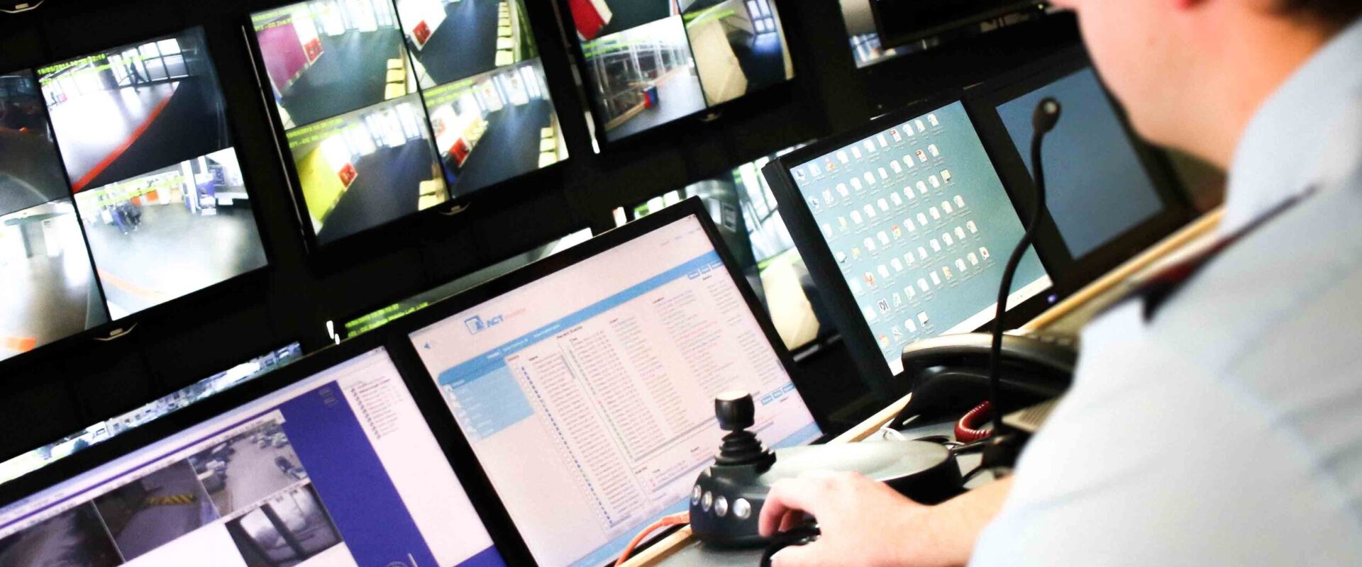 Man monitoring security screens | Security Services | Constant Security Services